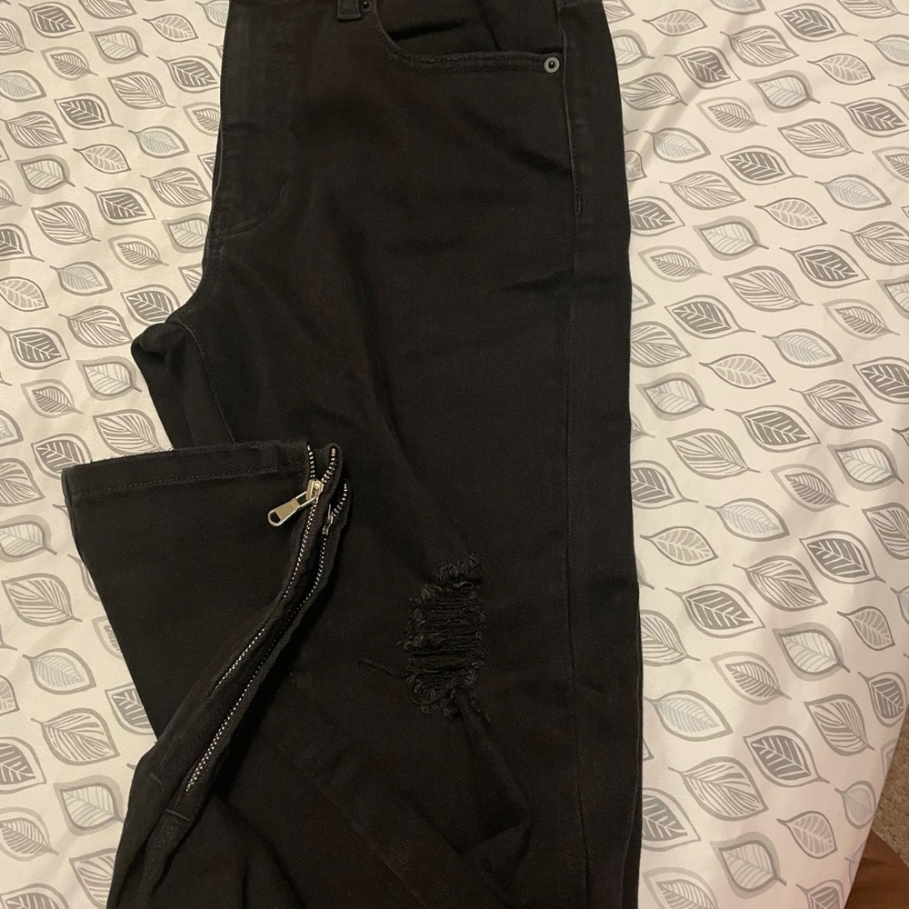 Men’s black jeans with destruction